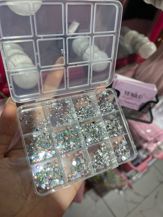 00113sku- Pedrería Gemas tornazol y plateadas para maquillaje con estuche